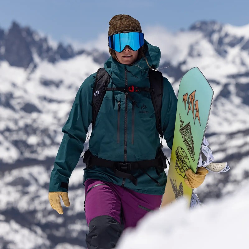 Jones rider Marissa Krawczak wearing the Women's Shralpinist Stretch Jacket in Pacific Teal