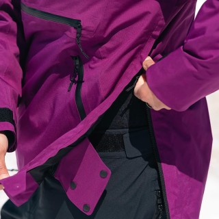 Ali Miller is wearing the Women's MTN Surf Recycled Anorak in Deep Purple