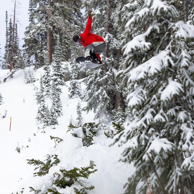 Jones rider Harry Kearney wears the Men's MTN Surf Recycled Bibs in Smoke Gray