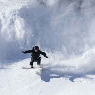 Jeremy Jones wearing the Mountain Surf parka in Stealth Black