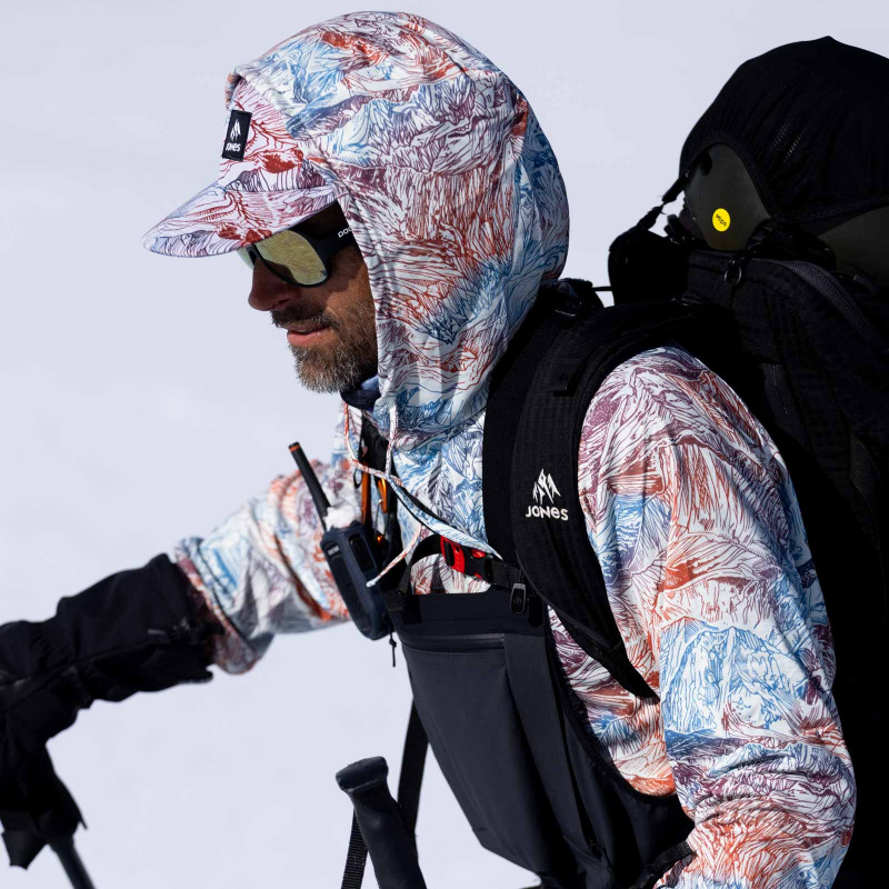 Jeremy Jones wears the Shasta Recycled Tech Hoodie during a spring splitboarding session.